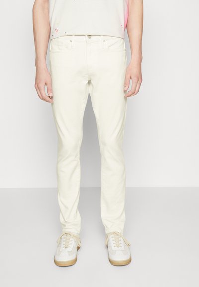 FRAME HOMME - Karcsúsított farmerek - whisper white