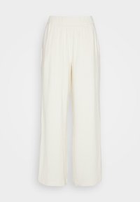 Wijde broek in een lichte ivoorkleur. Gemaakt van een textuurstof, met een elastische tailleband en een losse pasvorm voor comfort.