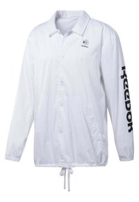 Giacca a vento bianca con colletto, bottoni a pressione anteriori, orlo regolabile con cordoncino e logo "Reebok" nero sulla manica sinistra.