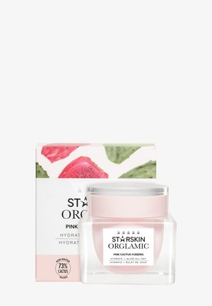 Un pot rose de crème hydratante Starskin Orglamic Pink Cactus Pudding se trouve devant sa boîte assortie à motif de cactus.
