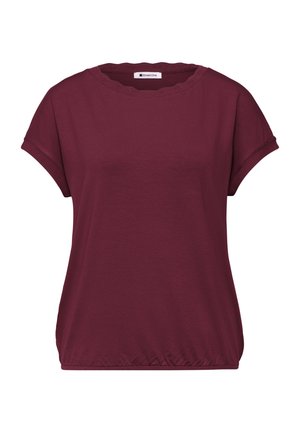 Blouse bordeaux à manches courtes avec encolure ronde festonnée, coupe décontractée, ourlet élastique et étiquette de marque « Street One » à l’intérieur du col.