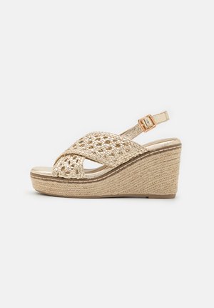 Sandalen met plateauzool - gold