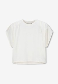 Haut blanc à manches courtes avec un col rond, texture douce et coupe décontractée. Présente des plis subtils aux épaules et un ourlet droit.