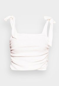 Top branco sem mangas com alças atadas, apresentando textura franzida e um design ajustado. Feito de material suave, adequado para uso casual.