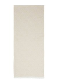 Beige valmistettu puuvillatyyli, jossa on hienovarainen timantin kuvio, fringed-reunat ja pehmeä rakenne, suunniteltu monipuoliseen käyttöön.