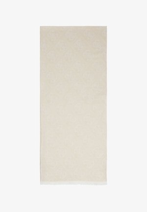 Beige woven cotton towel with a subtle diamond pattern, fringed edges, and a soft texture, designed for versatile use.
