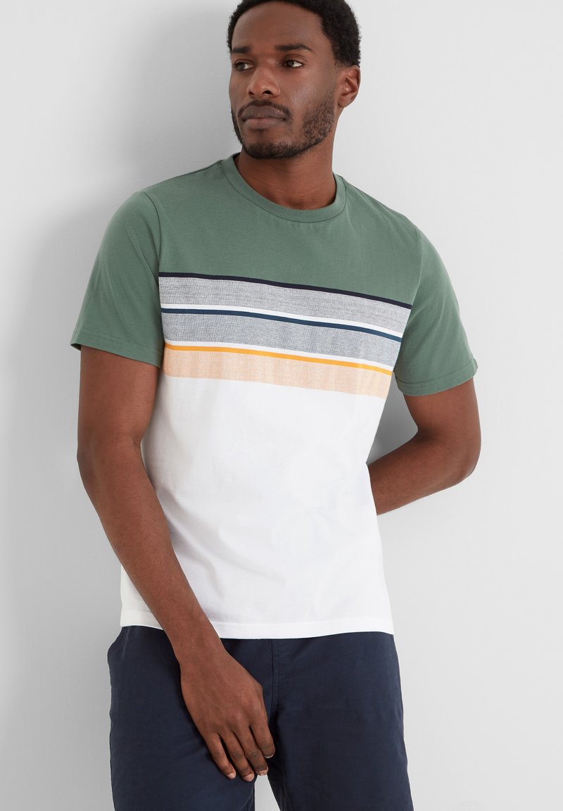 Green cotton t-shirt with short sleeves, featuring horizontal striped patterns in gray, navy, and yellow on the chest, white lower section.