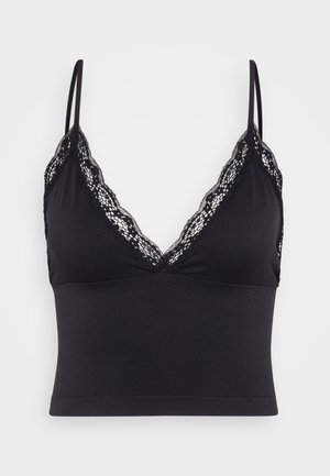 Camisole noire avec dentelle et bretelles ajustables, présentant un design à encolure en V et une coupe ajustée. Tissu doux avec une texture lisse.