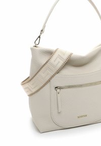 Light beige leather handbag with a textured surface, featuring a decorative strap with a geometric pattern and a front zipper pocket.