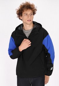 Schmuddelwedda urban rain - Chaqueta outdoor - schwarz königsblau colorblock