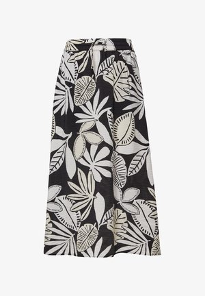 Zwarte stoffen rok met grote witte bladerenpatronen. Voorzien van een elastische tailleband met een strik. De textuur lijkt gekreukt of rimpelig.