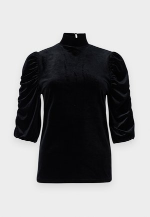 Svart sammetstopp med hög krage, korta puffärmar och nyckelhålsdetalj i ryggen. Slät textur med en figurnära silhuett.