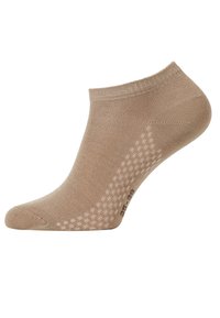 Chaussette beige mi-mollet avec un motif texturé sur le côté, dotée d'une finition tricot lisse et d'un talon renforcé, marquée de la taille 35-38.