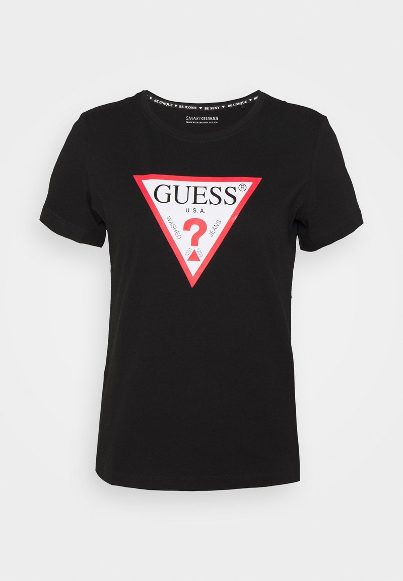 T-shirt noir en coton avec un logo triangulaire rouge au centre affichant le texte "GUESS U.S.A.". Manches courtes et encolure arrondie.