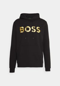 Felpa nera con cappuccio e tasca frontale, caratterizzata da un grande logo dorato "BOSS", cappuccio con cordino e polsini a coste. Realizzata in tessuto morbido con una texture liscia.