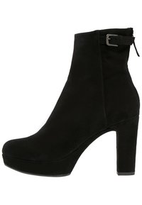 Black suede ankle boot with a high heel, rounded toe, and a side buckle detail. Smooth texture and minimalist design.