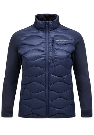 Marineblauwe jas met een gevoerde voorzijde met golvend patroon, zachte stoffen mouwen, hoge kraag en een ritsvak op de borst.