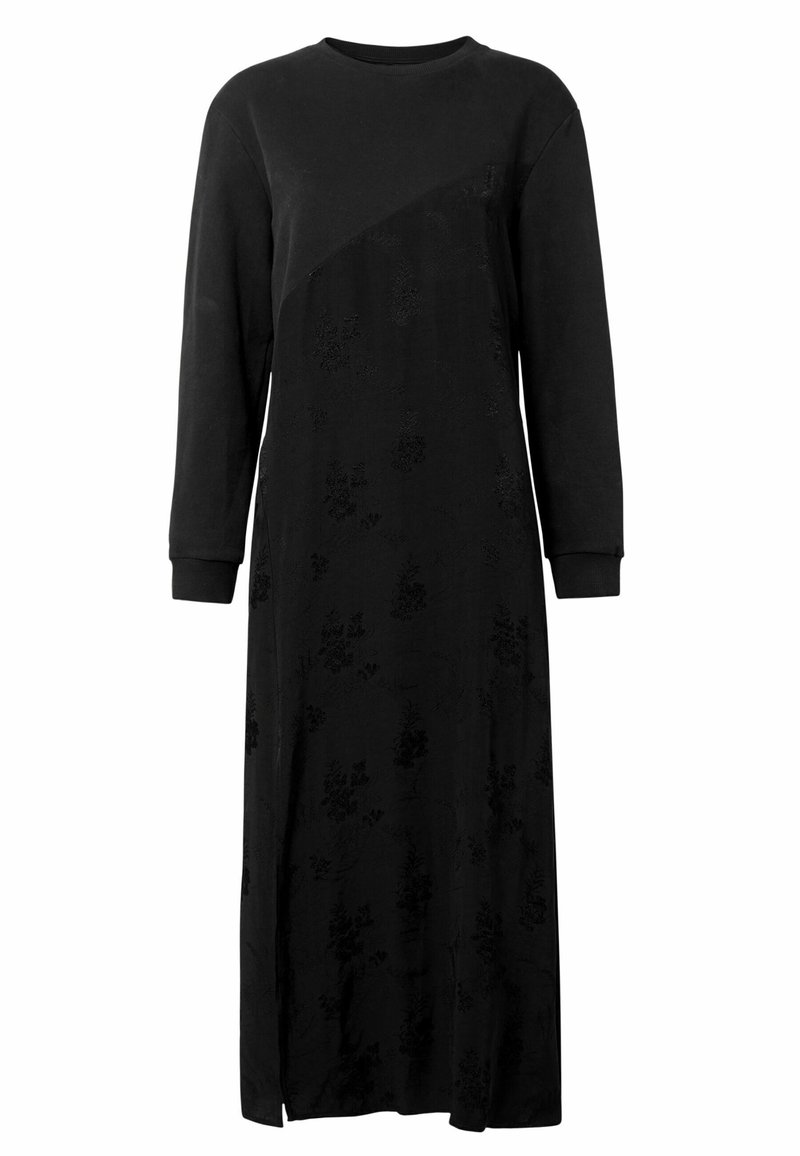 Lange zwarte jurk met lange mouwen, ronde halslijn en subtiel bloemenpatroon op de onderste helft en diagonaal op de borst.
