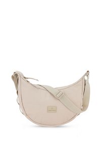 Beige crescent-shaped shoulder bag made from soft fabric, featuring a subtle textured surface, adjustable strap, and branded label.