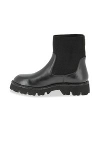 Bota negra de tobillo hecha de cuero suave con una parte superior de tela acanalada. Suela de goma gruesa con un dibujo texturizado para mayor agarre.