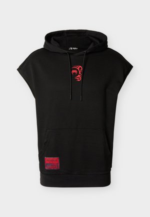 Black hooded sleeveless sweatshirt, featuring a red tribal pattern on the chest and a red logo patch on the front pocket. Soft fabric.