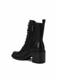 XTI Botines con cordones - black
