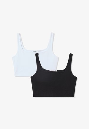 Due top cropped in bianco e nero, realizzati in tessuto a costine. Entrambi presentano spalline larghe e un scollo quadrato, progettati per il massimo comfort.