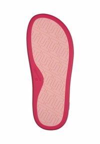 Sulan på en sko, med en rosa gummibas som har ett strukturerat mönster och en upphöjd rosa kant runt kanterna. Storlek 37 märkt på sidan.