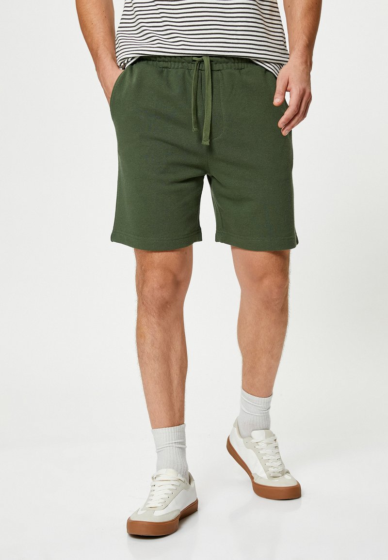 Koton FLORAL CUT WORK - Pantalones deportivos - green