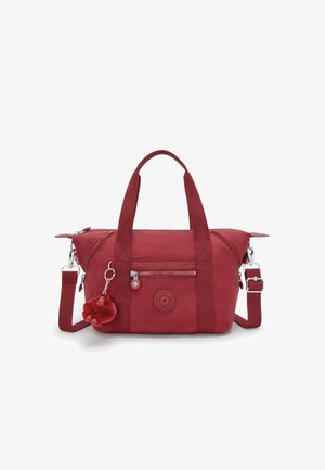 Borsa a tracolla rossa in tessuto con manici corti e tracolla rimovibile. Presenta una tasca con zip e un charm a pompon. Logo rotondo sul davanti.