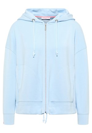 Lichtblauwe zip-up hoodie van zachte stof. Heeft een capuchon, twee grote voorzakken en details met een trekkoord. Soepele textuur en een ontspannen pasvorm.