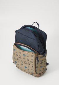 Dark blue fabric backpack with a front pocket featuring a tan surface, printed with blue outdoor-themed illustrations. Zipper closures on both compartments.