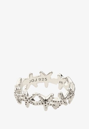 Bague en argent sterling présentant des formes d'étoiles de mer interconnectées, surface texturée avec des accents en relief et un anneau intérieur lisse. Marquée "JGJ 925."