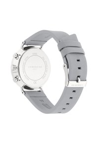 Grijze siliconen armbandhorloge met een kast van roestvrij staal, drie knoppen en een gegraveerde achterkant, met branding en details over waterbestendigheid.