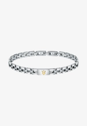 Silberner Metallarmreif mit ineinandergreifenden Gliedern, der ein goldenes Akzent und kleine klare Steine auf einer zentralen Platte mit einem Krondesign enthält.