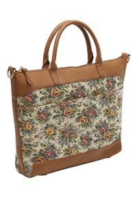 Sac en cuir marron avec un devant en tissu à tapisserie florale. Dispose de poignées doubles, d'une fermeture éclair et d'une poche avant avec un motif floral.