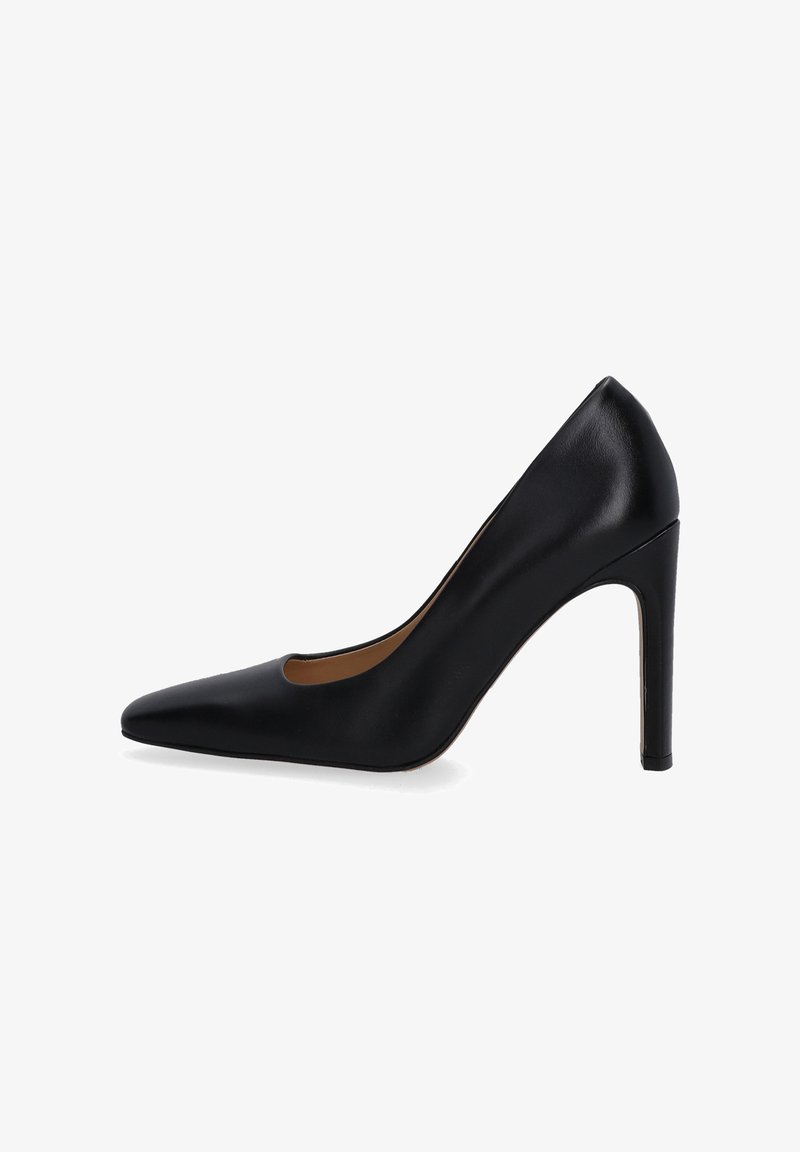 Black leather high heel pump with a pointed toe and a curved cutout. Features a slim stiletto heel and smooth finish for sleek appearance.