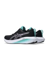 Black athletic shoes with turquoise accents, textured upper, and a white foam midsole featuring a wave pattern. Designed for comfort and support.
