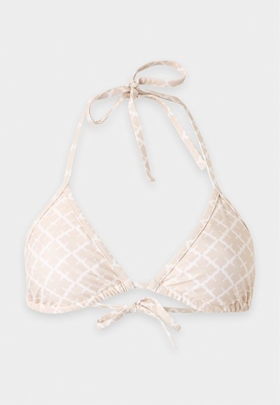 Haut de bikini triangulaire beige avec motif géométrique blanc et liens au niveau du cou et du dos, présenté à plat sur un fond clair.