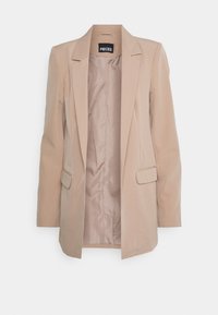 Beige tailored blazer with a smooth texture, two front pockets, notched lapels, and a satin lining visible inside. Brand label: PIECES.