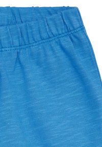 Blauwe lichte stof met een gestructureerde, gemêleerde afwerking. Voorzien van een geraffineerde, elastische tailleband voor flexibiliteit en comfort.