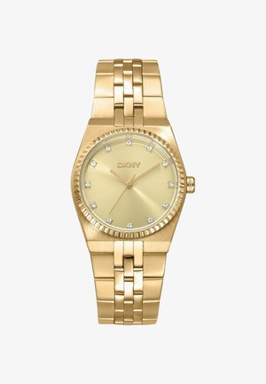 Goldfarbene DKNY-Armbanduhr mit Metallgliederarmband, rundem Zifferblatt, Kristall-Stundenmarkierungen und drei schlanken Zeigern zur Anzeige der Uhrzeit.