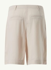 Beige linen shorts with a straight cut, featuring two back pockets and a smooth texture. Hemline finishes with neat stitching.