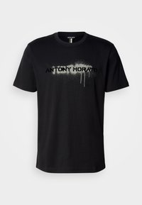 Tricou din bumbac negru cu un grafic text sprayat "ANTONY MORATO" în gri, cu detalii picurânde, mâneci scurte și decolteu rotund.
