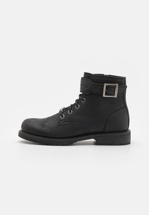 Botines camperos - black