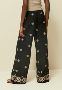Next EMBROIDERED WIDE LEG - Tygbyxor - black