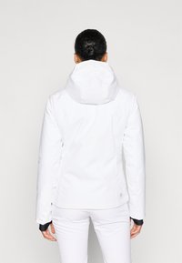 White waterproof jacket with a hood, featuring a fitted design, sleek texture, and contrasting black accents on the cuffs.