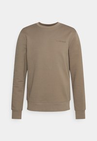 Sudadera de algodón marrón con cuello redondo y mangas largas. Presenta un logo bordado en el pecho. Textura suave y corte regular.