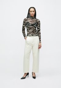 Marc Cain Nohavice - beige