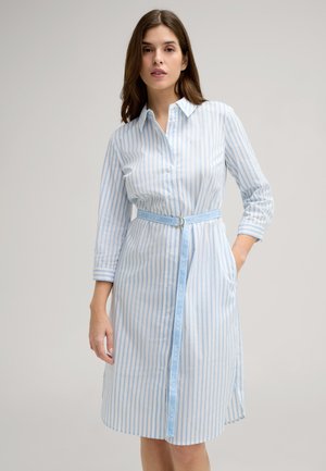 Light blue and white striped shirt dress with long sleeves, button-down front, and a belt featuring logo accents. Side pockets included.